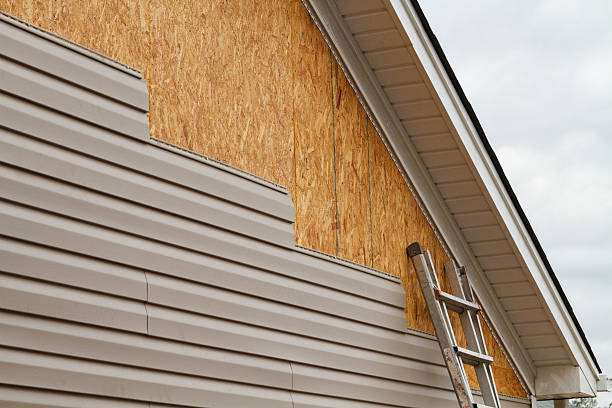 Professional Siding Replacement technician working in Durham, CT